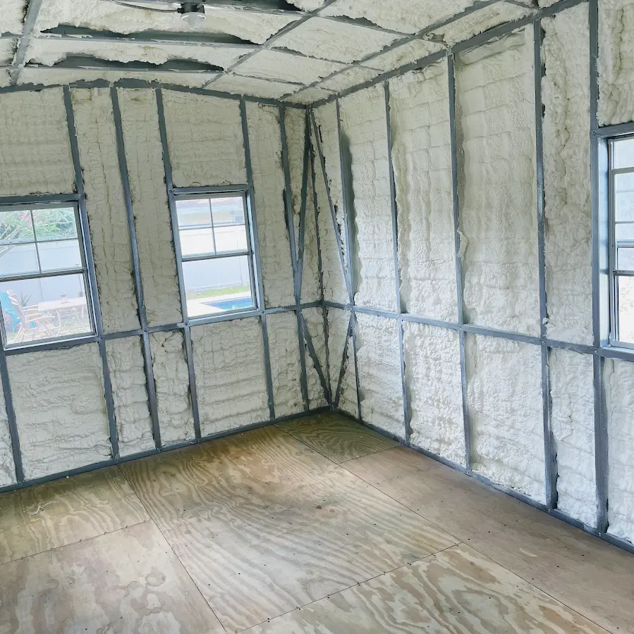 Closed-cell spray foam insulation applied to wall cavities in a residential project in Fultondale